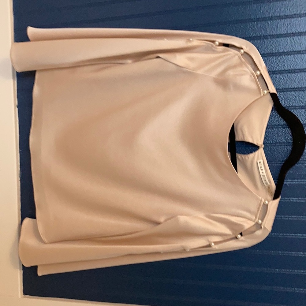 Lined beige blouse with bell sleeves & pearls